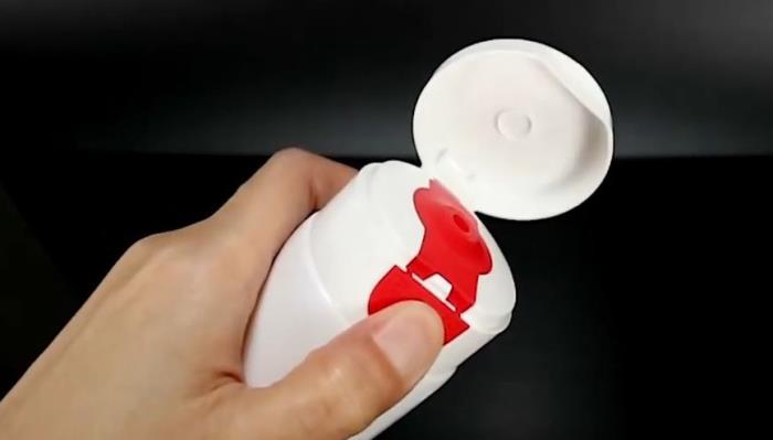 Positively practical: S Pack's Easy-Press Cap is designed for single-handed use